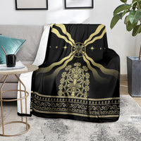 Black and gold mythological blanket with throne emblem, gold rays, and patterned border