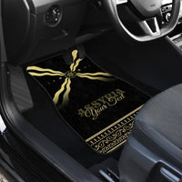 Black car mat with gold cross-star emblem and custom-style text, passenger area