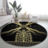 Black round carpet with gold emblem and ornate panel, star speckles around