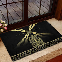 Black rubber doormat with gold mythic crest and sunburst rays, detailed trim