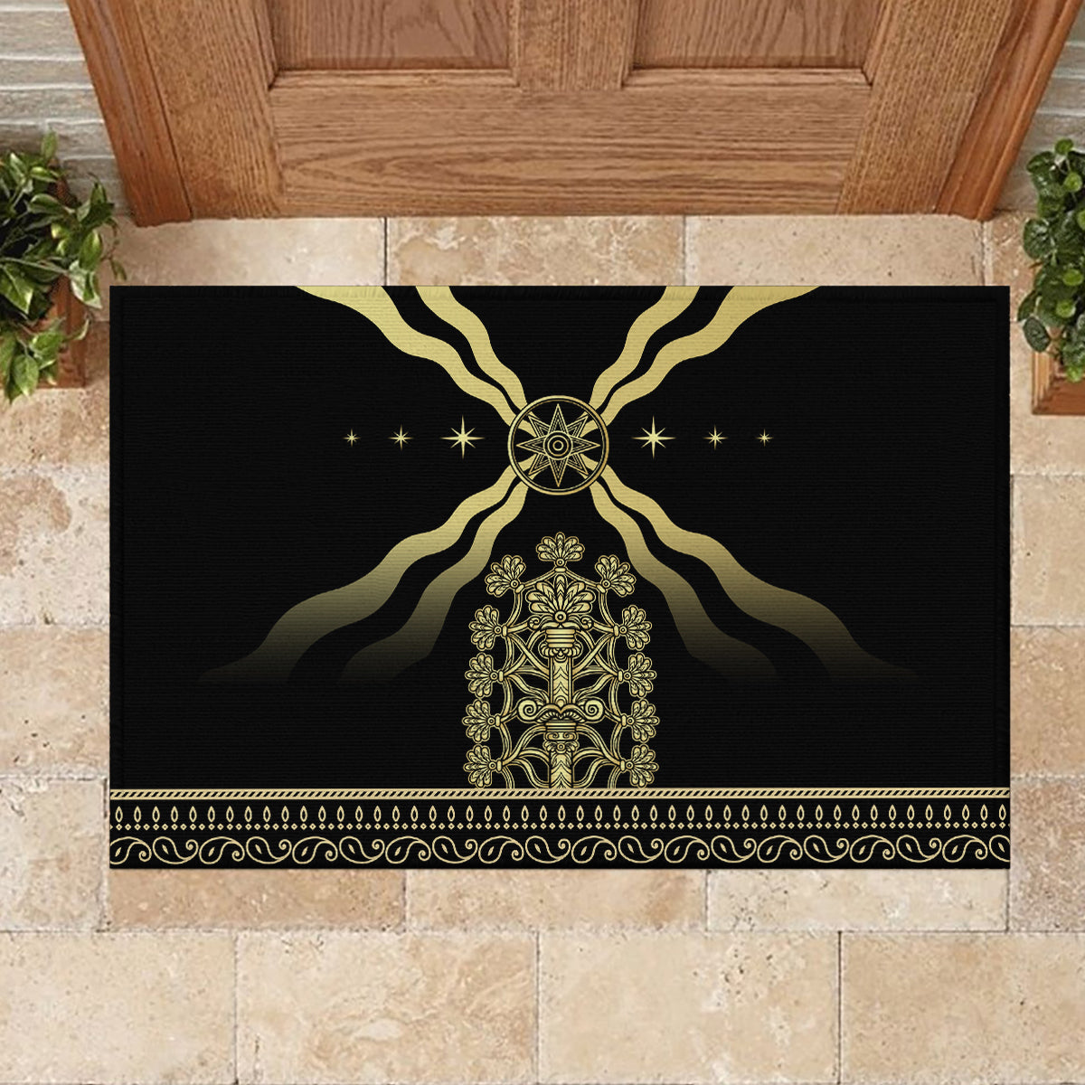 Black rubber doormat featuring gold crest center and sunburst halo, ornate border