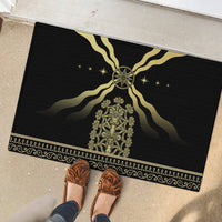 Black rubber doormat with gold sunburst emblem and ornate crest, border pattern