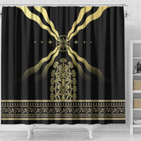 Black shower curtain with gold central throne-like figure, winged rays, and star details