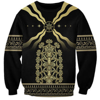 Black crewneck sweatshirt with gold Assyrian-style emblem and decorative border design