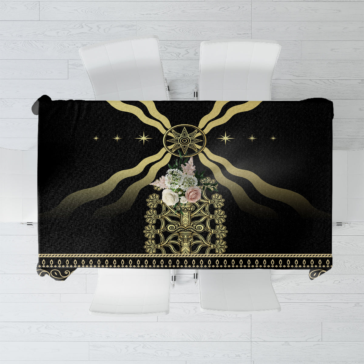 Black tablecloth with gold central crest, radiating lines, and ornate border hem