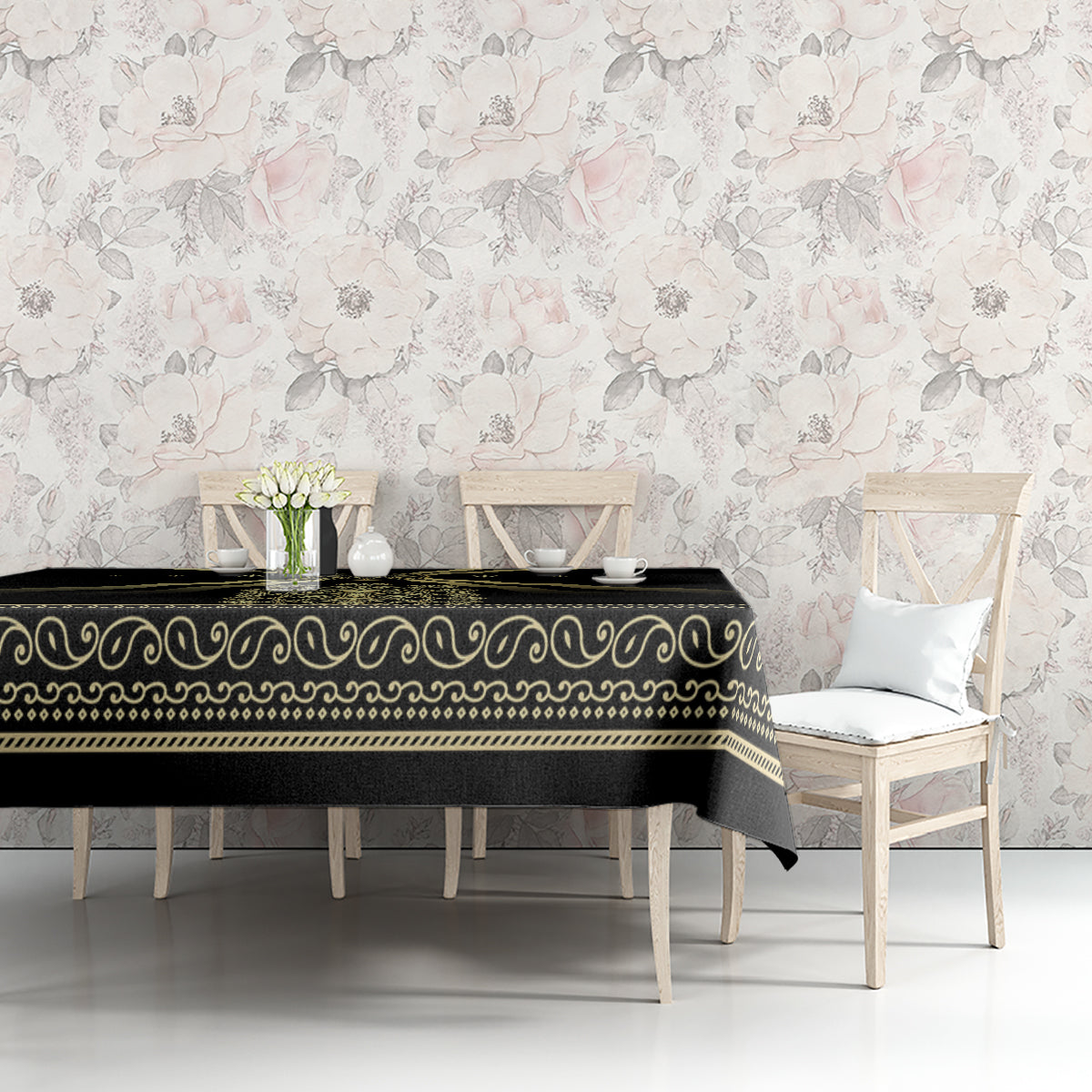 Black tablecloth with gold scroll trim and decorative edge border