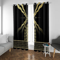 Black curtain panels with gold medallion rays and decorative banded trim at bottom
