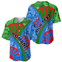 Baseball jersey shown front and back with blue-green tribal print and 'ROMANI' graphic