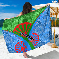 Large Romani graphic sarong with green and blue mandala designs and red lettering
