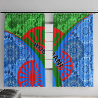Blue-green window curtains with red sunburst medallion and diagonal tribal stripe pattern.