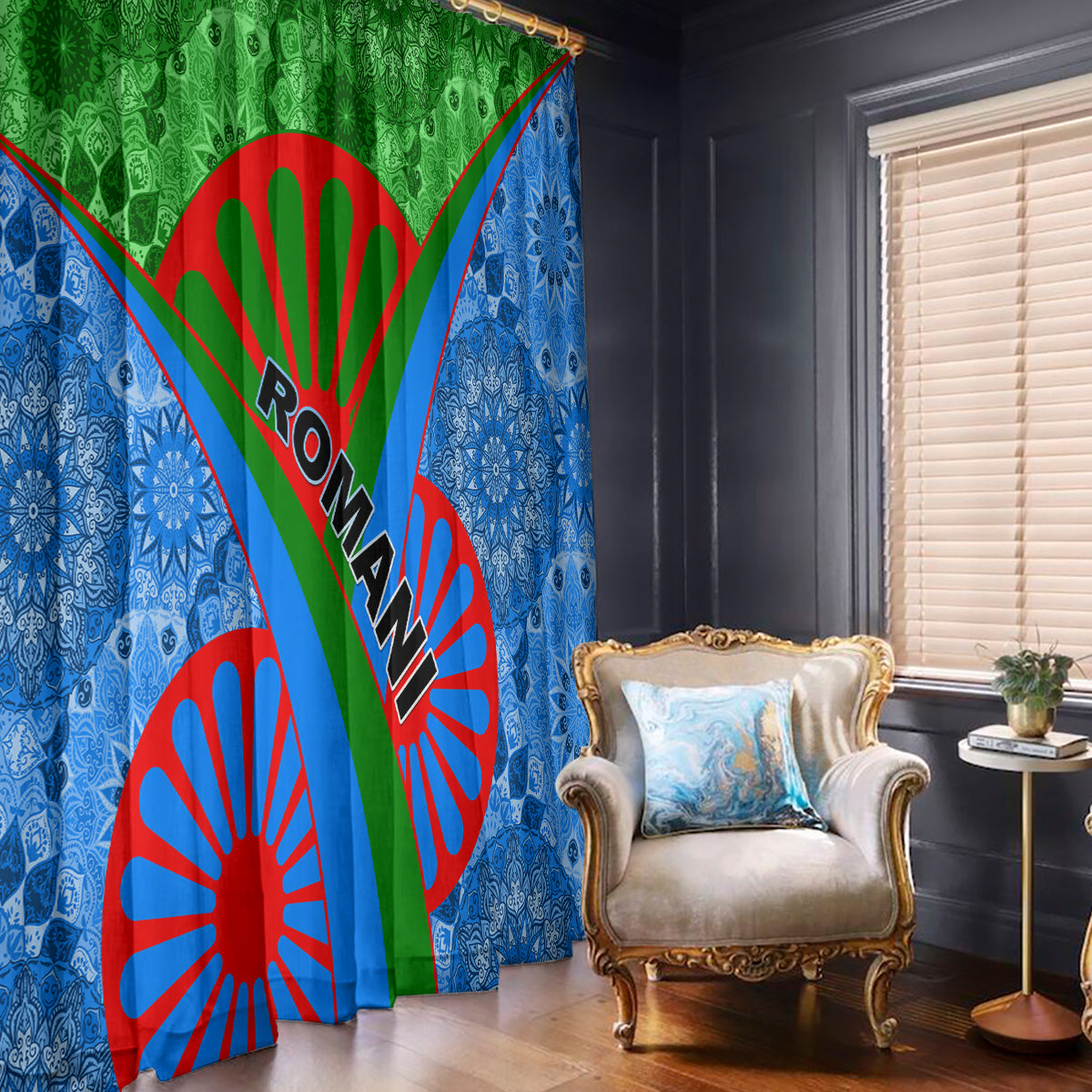 Blue window curtain with green top panel and red tribal sunburst graphic, hanging panel pair.