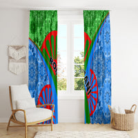 Blue-green window curtains with red sunburst centerpiece and diagonal tribal stripes.