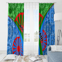 Two-panel window curtain set: blue and green fabric with red sunburst and tribal diagonal motif.