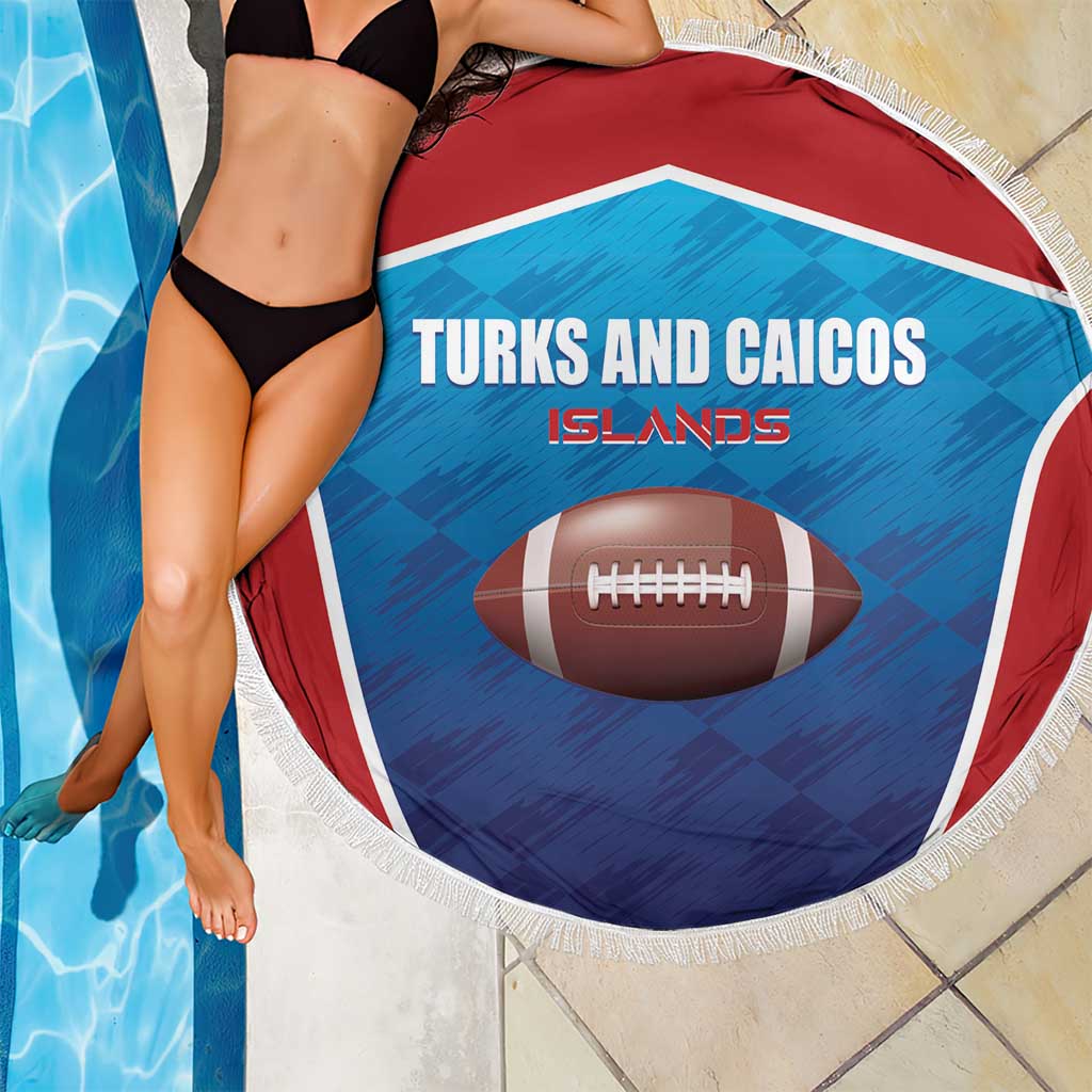 Round rugby beach blanket draped by two people, Turks and Caicos Islands football print and fringe