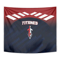 Close-up rectangular tapestry with red top stripe, navy field, white pattern, and TITANES