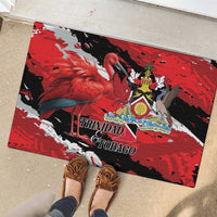 Red rubber doormat with flamingo artwork and crest design, flat rectangular mat