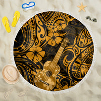 Round beach blanket with white fringe, gold and black Polynesian pattern and ukulele graphics.