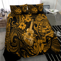 Gold and black ukulele-themed bedding set with floral tribal swirls and two pillow shams