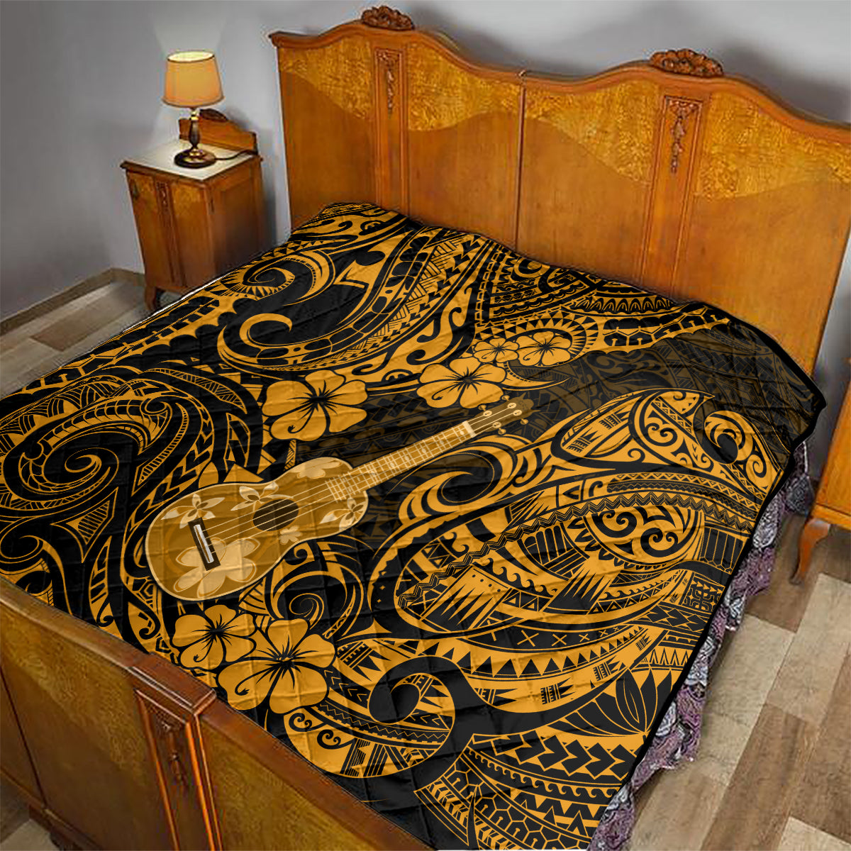 Gold and black ukulele print quilt laid on a bed with Polynesian scroll and flower designs