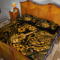 Gold and black quilt bed set with guitar graphic and ornate Polynesian swirl pattern
