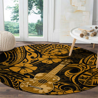 Round gold and black Polynesian area rug with ukulele design and wave swirls