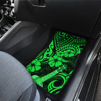 Green Polynesian pattern car floor mat, front seat area with ukulele and hibiscus