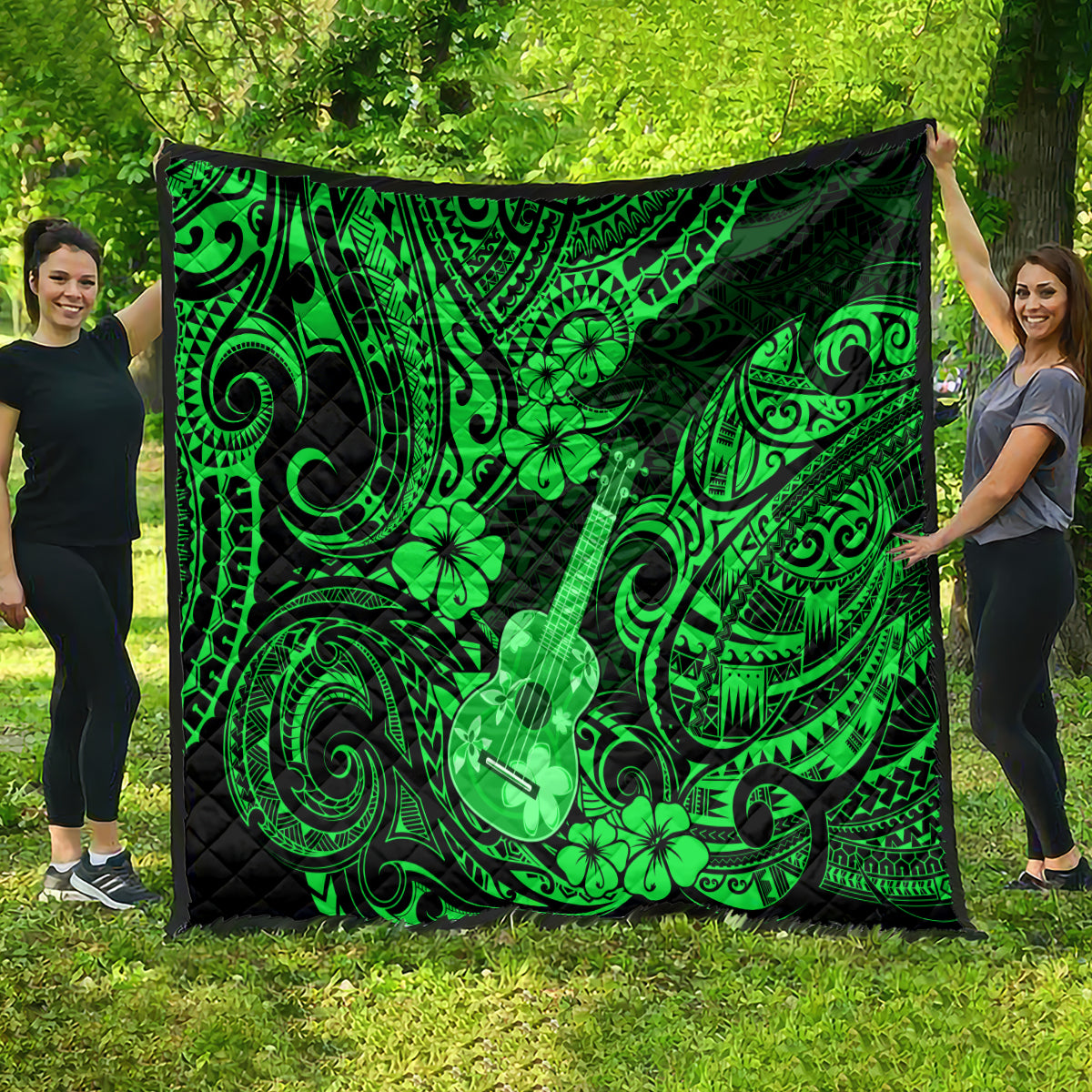 Green ukulele and clover Polynesian pattern quilt blanket draped outdoors