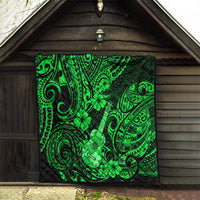 Green ukulele and clover Polynesian pattern quilt blanket displayed on wooden wall