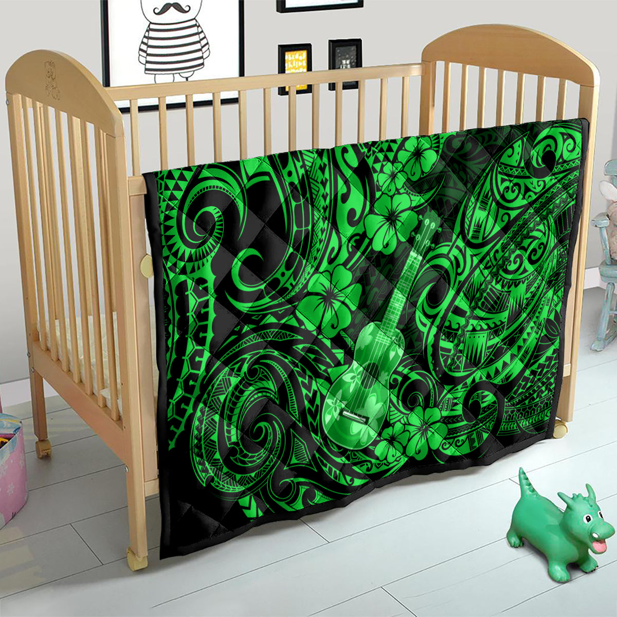 Green ukulele and clover Polynesian pattern quilt blanket on wooden baby bed