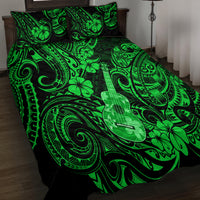 Green quilt bed set with ukulele and swirl patterns; two matching pillows
