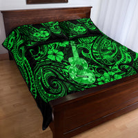 Green quilt bed set with ukulele clover and tribal scroll motifs; duvet corner