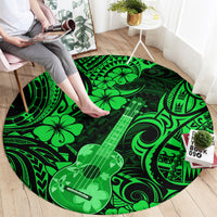 Green round carpet with large ukulele print and swirling tribal Polynesian pattern