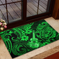 Green rubber doormat featuring polynesian swirl pattern and ukulele silhouette, rectangle