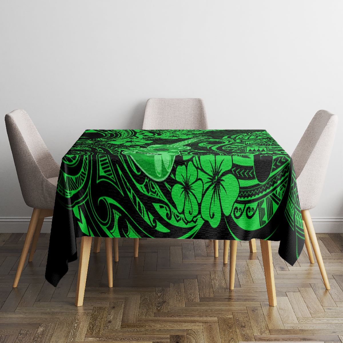 Green Polynesian-pattern tablecloth on square table with matching hibiscus and swirl design