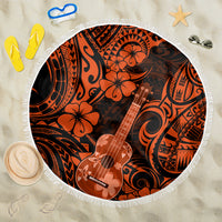 Orange and black round beach blanket with fringe edge, guitar floral Polynesian pattern