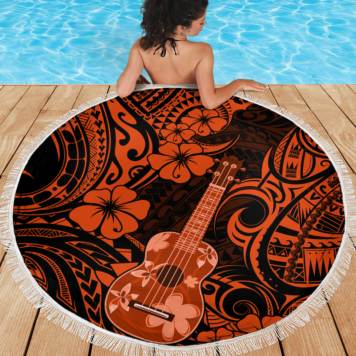 Orange and black round beach blanket with fringe border, guitar hibiscus Polynesian print