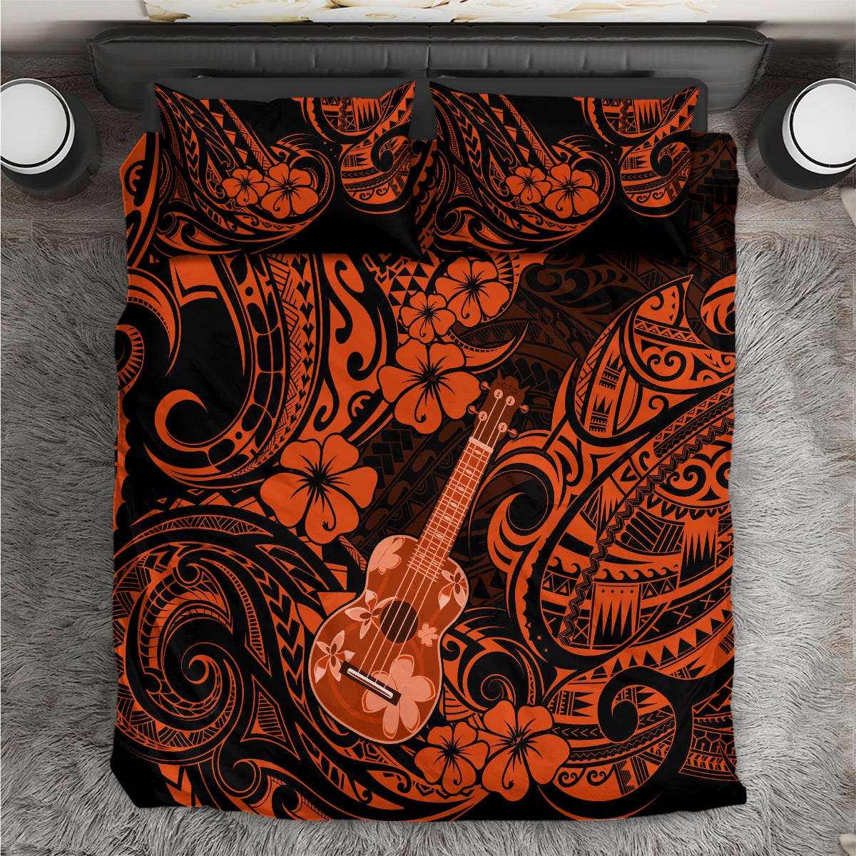 Orange/black Polynesian ukulele bedding set with floral tribal pattern, duvet close-up