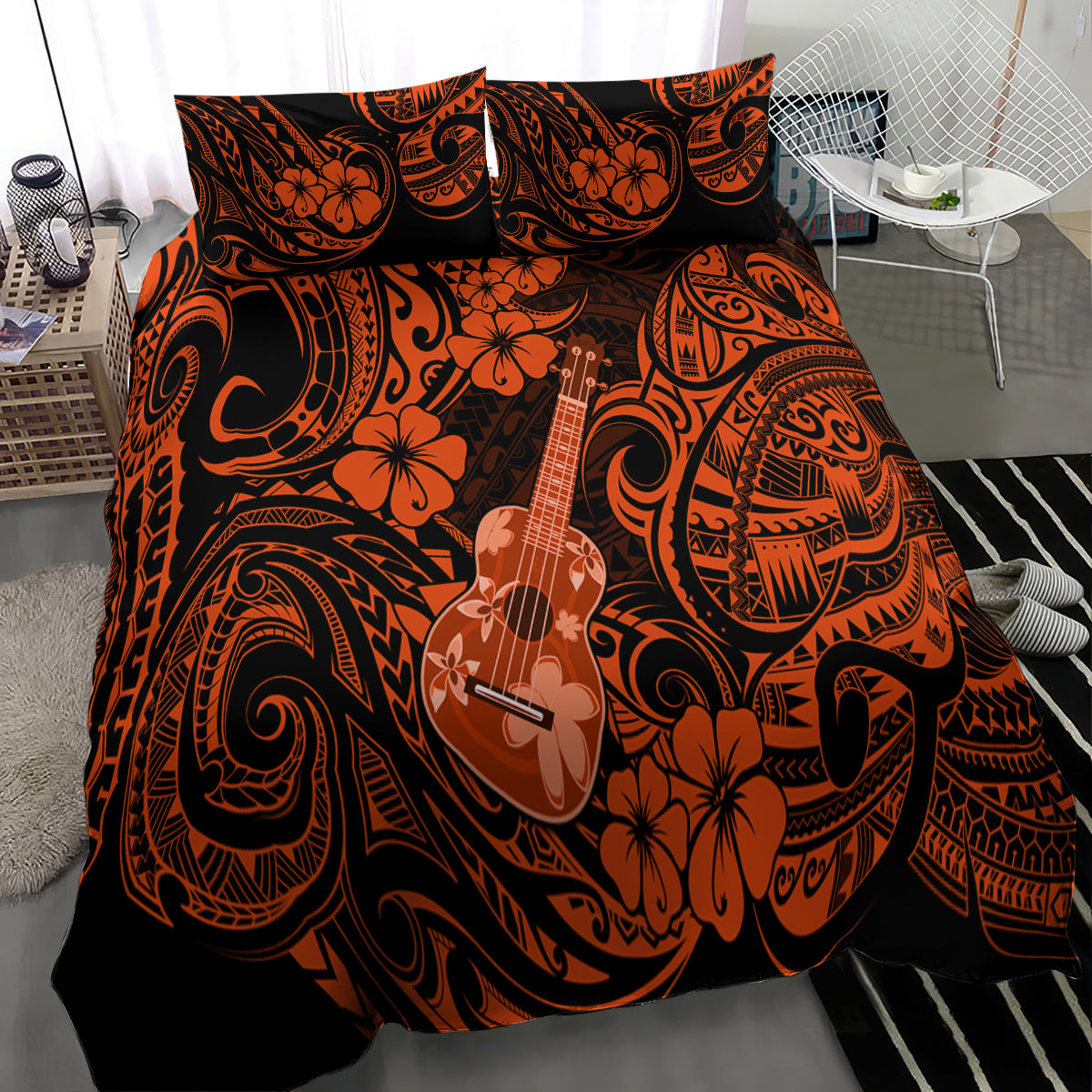Orange/black Polynesian ukulele bedding set with floral tribal print, angled bed view