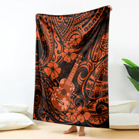 Orange and black ukulele-themed Polynesian patterned blanket with flowers, draped