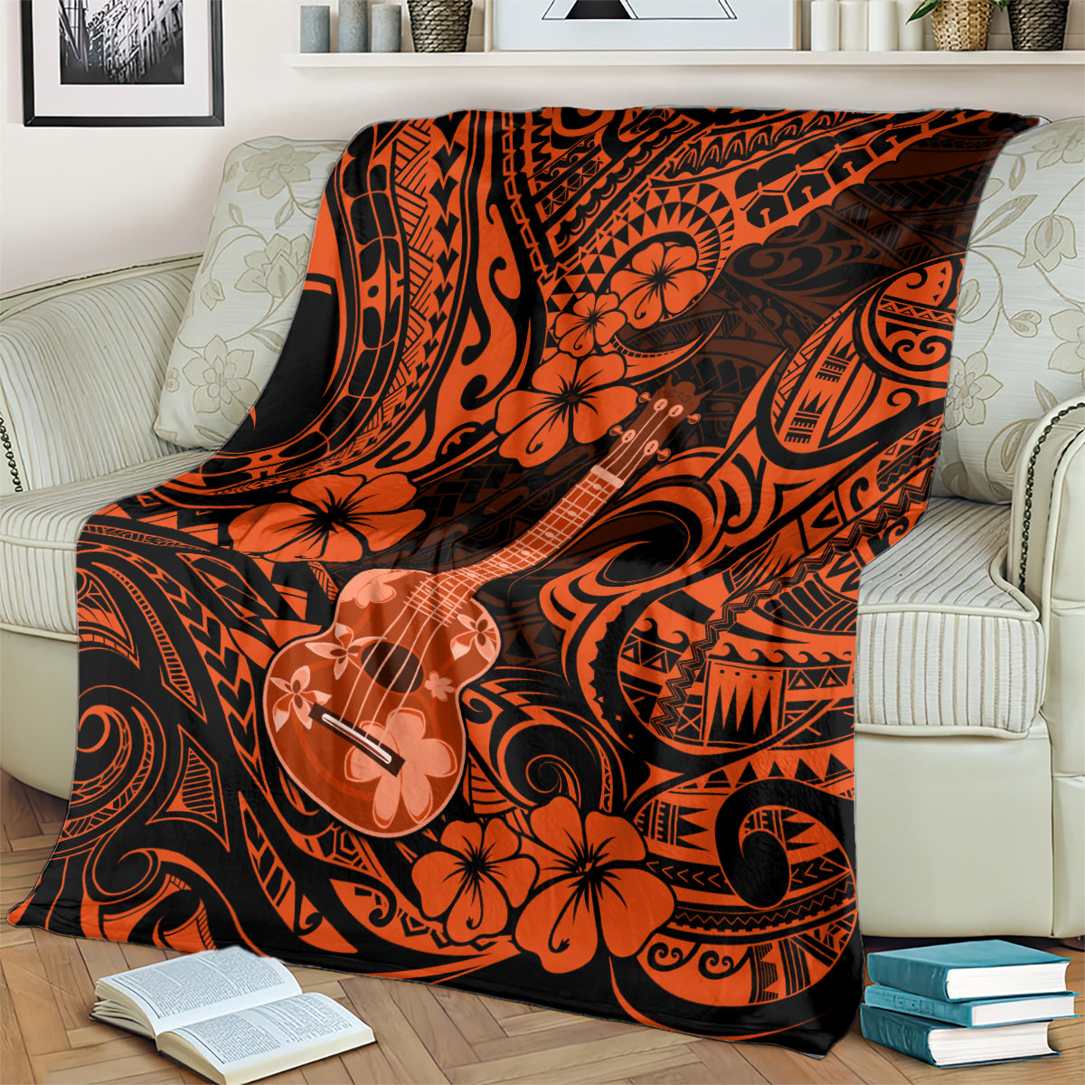 Orange and black ukulele-themed Polynesian patterned blanket spread over a sofa
