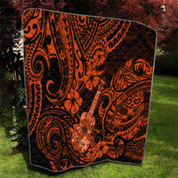 Hawaii ukulele quilt in orange and black with ukulele, flowers, and tribal scroll designs