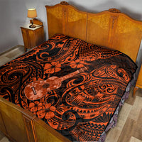 Hawaii ukulele quilt spread on bed, orange and black Polynesian ukulele and floral pattern