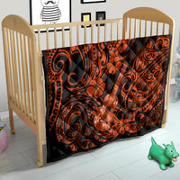 Hawaii ukulele quilt over crib, orange and black Polynesian ukulele and flower motifs