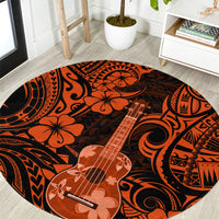 Round orange and black ukulele print area rug with floral and guitar motif