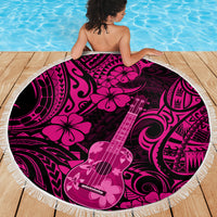Round pink beach blanket with fringed edge, hibiscus and guitar print on dark base