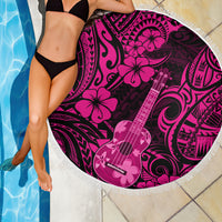 Round pink beach blanket with fringed edge, hibiscus and guitar pattern