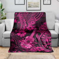 Pink polynesian ukulele blanket with hibiscus flowers and guitar print, spread on sofa
