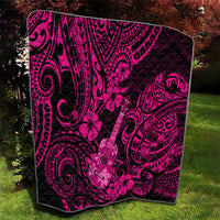 Pink and dark Polynesian quilt featuring ukulele silhouette, flowers, and swirling motifs.