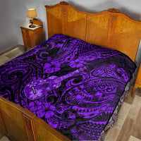 Purple Polynesian ukulele quilt on bed with black backing and floral guitar motif