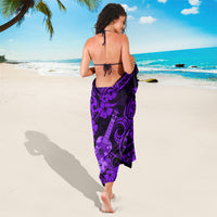 Purple Polynesian sarong with ukulele and flower motifs, wrap-style
